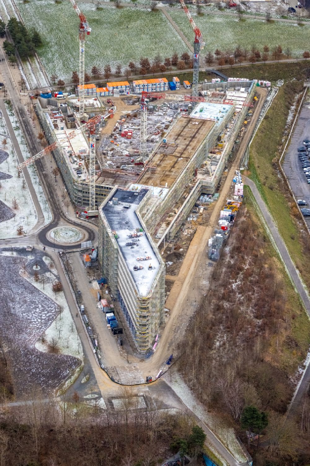 Dortmund from the bird's eye view: Wintry snowy new construction of the company administration building of Materna Information & Communications SE on street Robert-Schuman-Strasse in the district Phoenix West in Dortmund at Ruhrgebiet in the state North Rhine-Westphalia, Germany