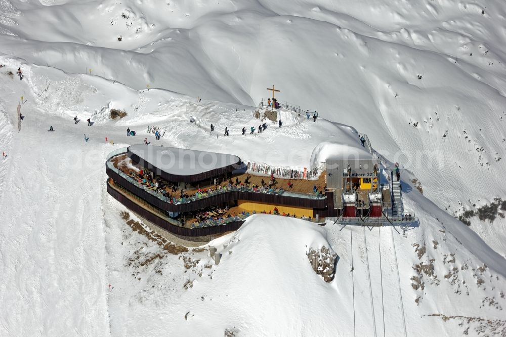 Aerial image Oberstdorf - Wintry snowy newly opened peak station of the Nebelhornbahn in Oberstdorf in the state of Bavaria. The summit restaurant was designed by architect Hermann Kaufmann. Guests can walk around the summit via the Nordwandsteig