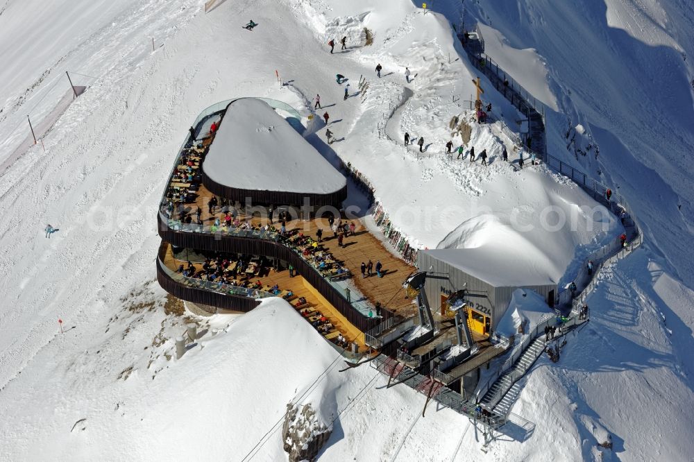 Oberstdorf from the bird's eye view: Wintry snowy newly opened peak station of the Nebelhornbahn in Oberstdorf in the state of Bavaria. The summit restaurant was designed by architect Hermann Kaufmann. Guests can walk around the summit via the Nordwandsteig