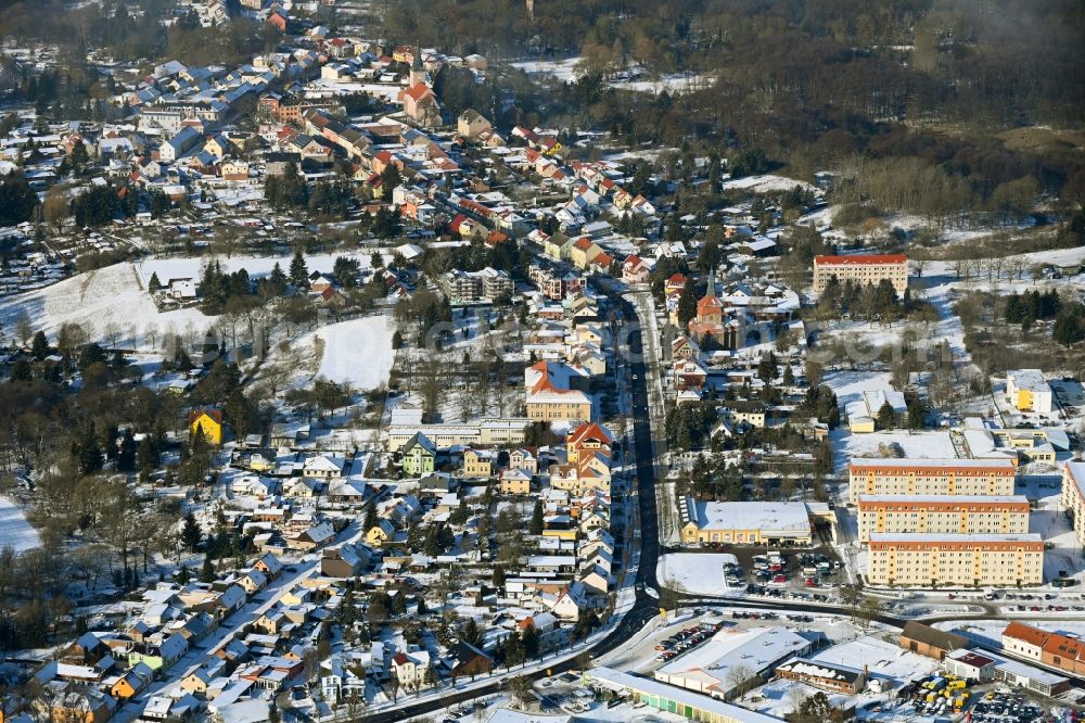 Aerial image Biesenthal - Wintry snowy town View of the streets and houses of the residential areas in Biesenthal in the state Brandenburg, Germany