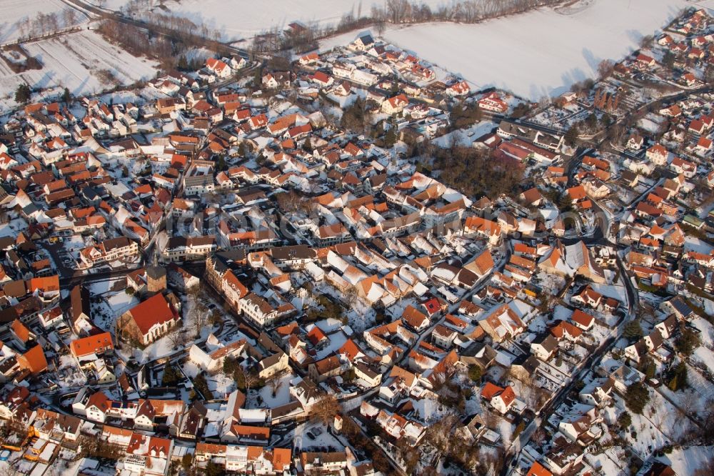 Billigheim-Ingenheim from above - Wintry snowy Town View of the streets and houses of the residential areas in Billigheim-Ingenheim in the state Rhineland-Palatinate