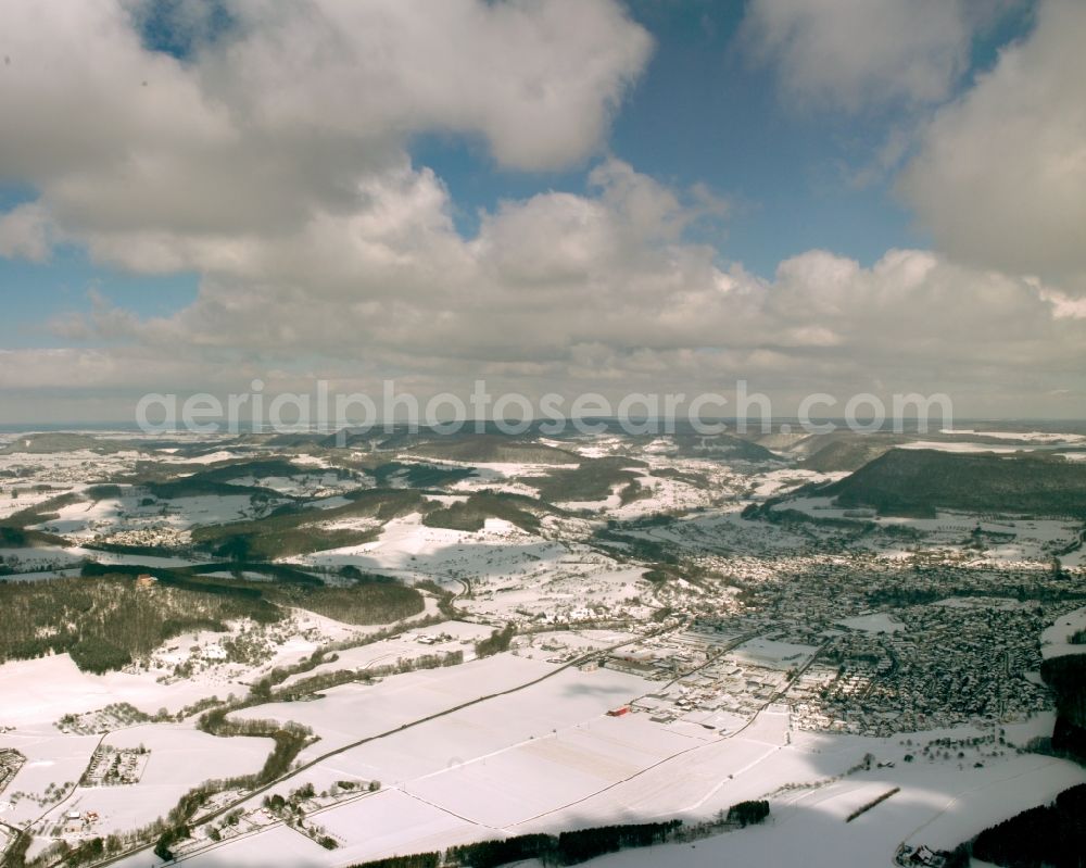 Donzdorf from above - Wintry snowy town View of the streets and houses of the residential areas in Donzdorf in the state Baden-Wuerttemberg, Germany