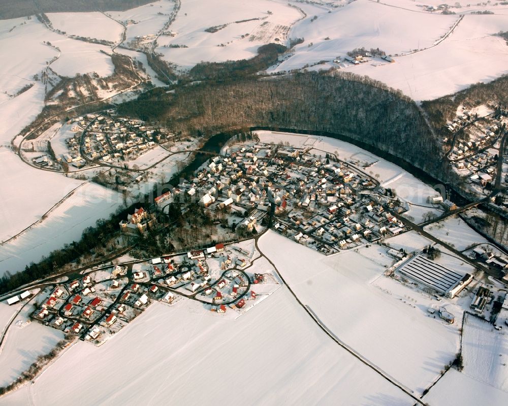 Aerial photograph Jagsthausen - Wintry snowy town View of the streets and houses of the residential areas in Jagsthausen in the state Baden-Wuerttemberg, Germany