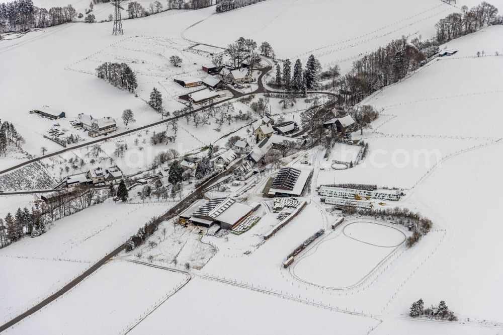 Aerial image Mosebolle - Wintry snowy streets and houses and residential areas in Mosebolle at Sauerland in the state North Rhine-Westphalia, Germany