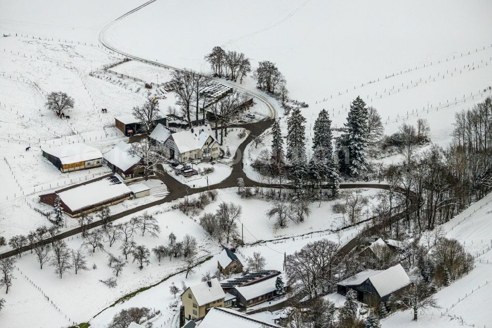 Mosebolle from above - Wintry snowy streets and houses and residential areas in Mosebolle at Sauerland in the state North Rhine-Westphalia, Germany