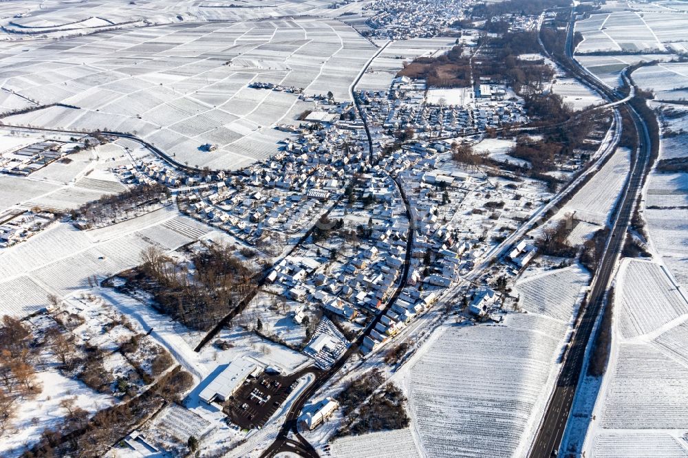 Aerial image Siebeldingen - Wintry snowy Town View of the streets and houses of the residential areas in Siebeldingen in the state Rhineland-Palatinate, Germany