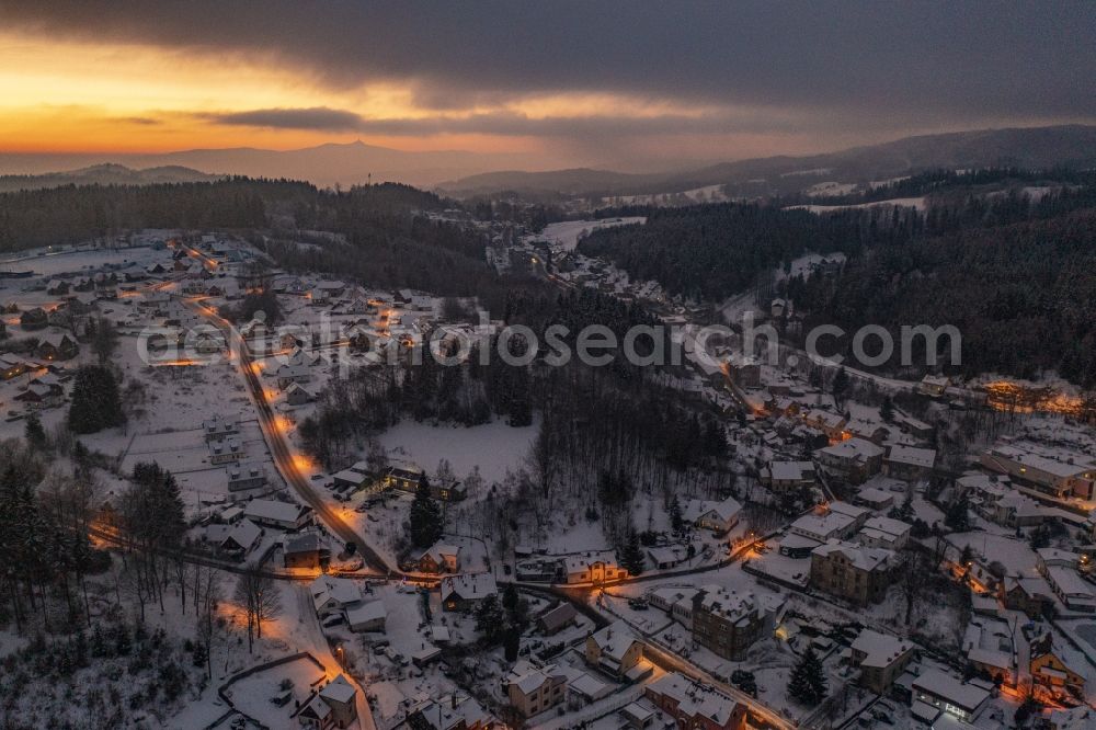 Smrzovka from above - Wintry snowy town View of the streets and houses of the residential areas in Smrzovka in Liberecky kraj, Czech Republic