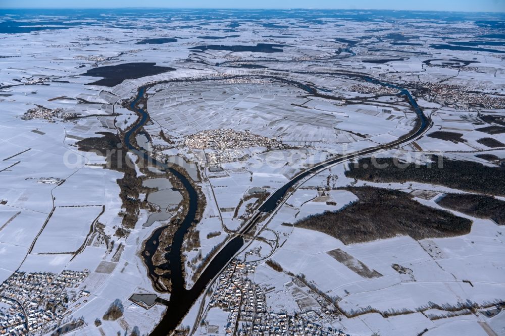 Sommerach from the bird's eye view: Wintry snowy town view on the banks of the Main - river course and Main Canal in Sommerach in the state Bavaria, Germany