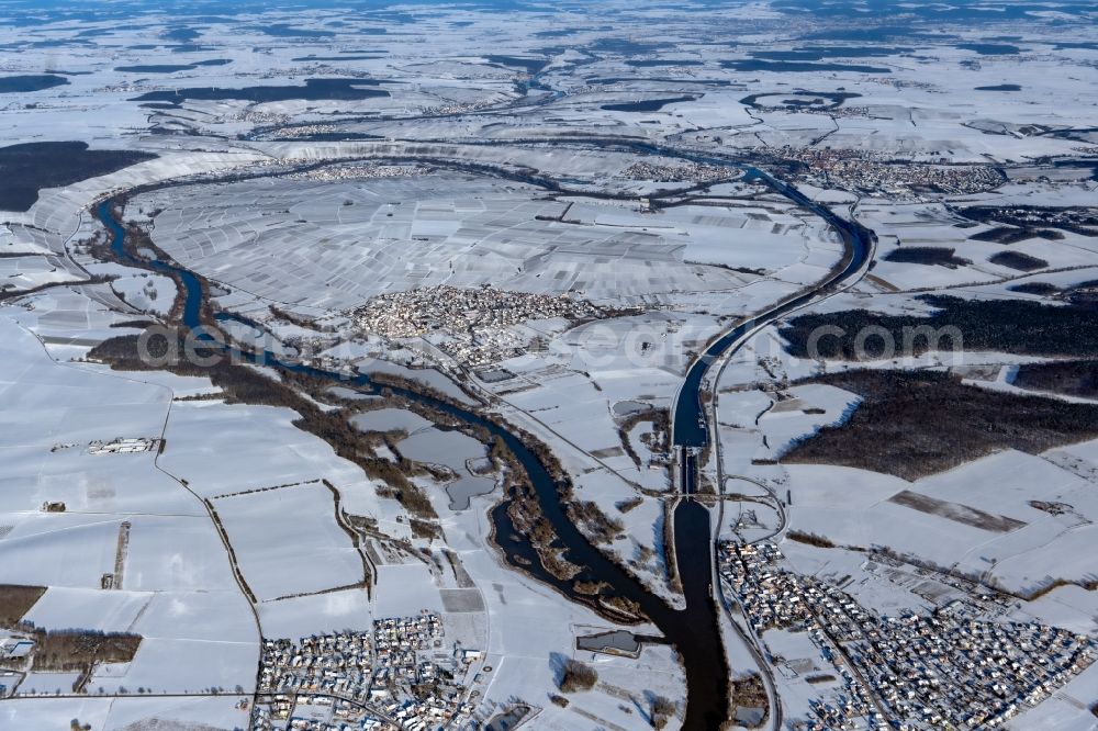 Aerial image Sommerach - Wintry snowy town view on the banks of the Main - river course and Main Canal in Sommerach in the state Bavaria, Germany