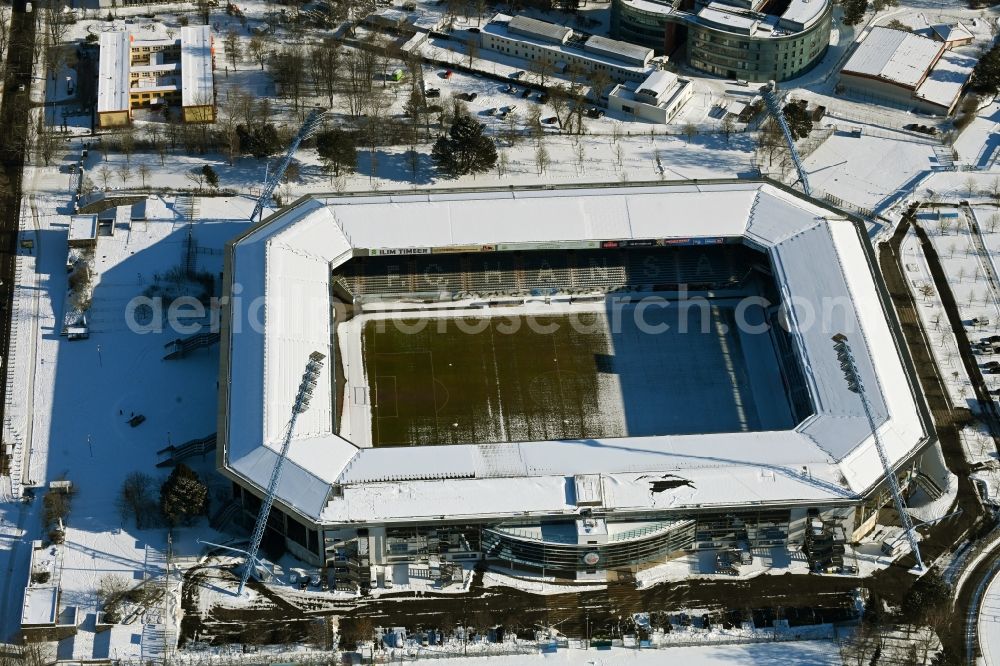 Aerial image Rostock - Wintry snowy sports facility grounds of the Arena stadium Ostseestadion (vormals DKB - Arena) in the district Hansaviertel in Rostock in the state Mecklenburg - Western Pomerania, Germany