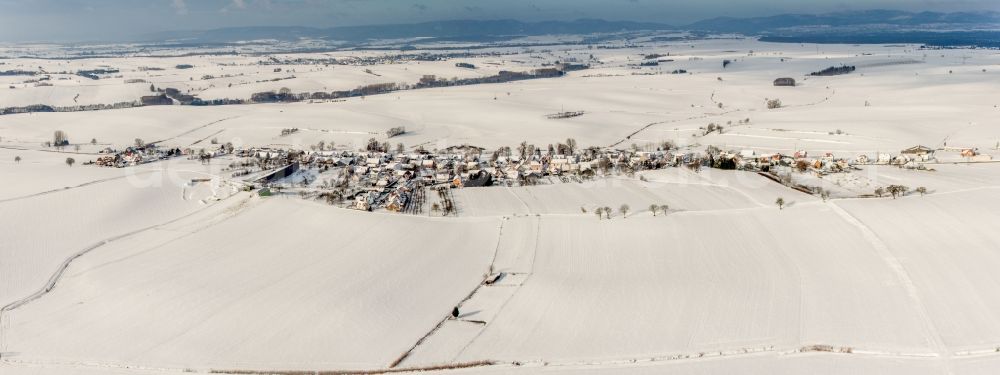 Aerial photograph Siegen - Wintry snowy Panorama perspective of Village - view on the edge of agricultural fields and farmland in Siegen in Grand Est, France