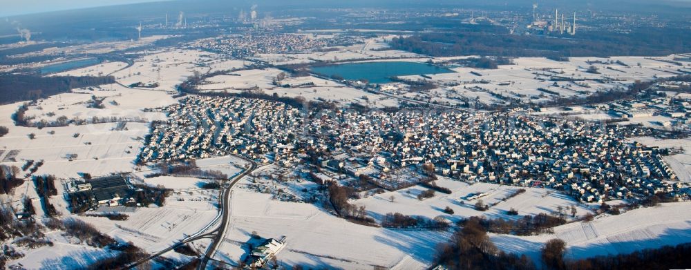 Aerial image Hagenbach - Wintry snowy Panoramic perspective Town View of the streets and houses of the residential areas in Hagenbach in the state Rhineland-Palatinate, Germany