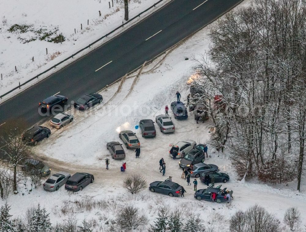 Aerial image Grönebach - Wintry snowy parking and storage space for automobiles on Haarfelder Strasse in Groenebach at Sauerland in the state North Rhine-Westphalia, Germany