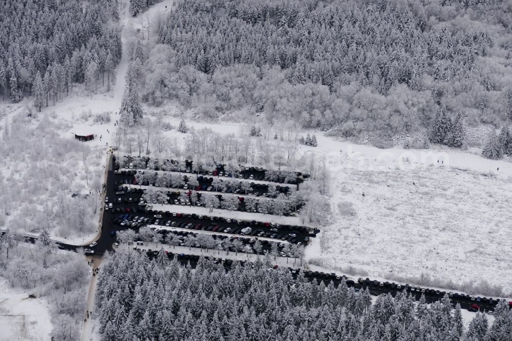 Meißner from above - Wintry snowy parking and storage space for automobiles on Hohen Meissner in Meissner in the state Hesse, Germany