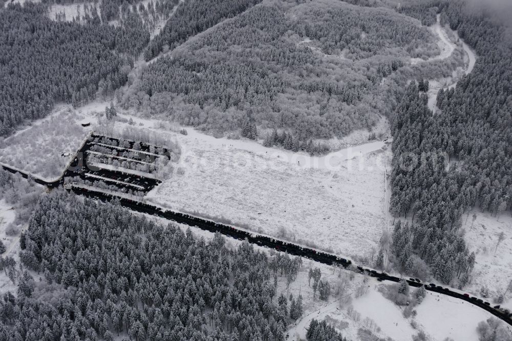 Aerial image Meißner - Wintry snowy parking and storage space for automobiles on Hohen Meissner in Meissner in the state Hesse, Germany