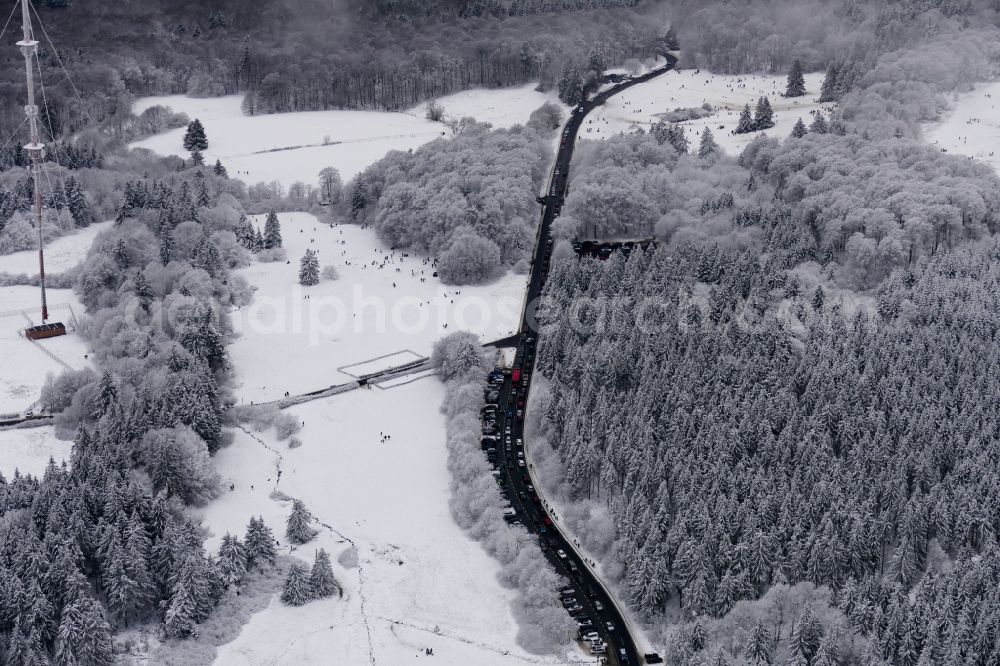 Aerial photograph Meißner - Wintry snowy parking and storage space for automobiles on Hohen Meissner in Meissner in the state Hesse, Germany