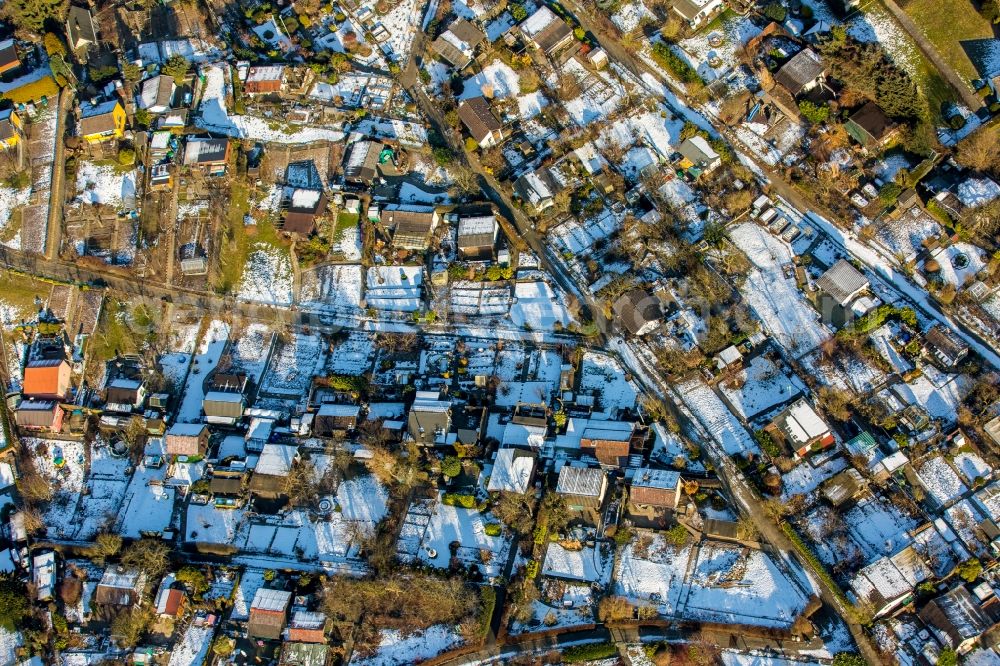 Aerial image Heiligenhaus - Wintry snowy Parcel of a small garden in Heiligenhaus in the state North Rhine-Westphalia