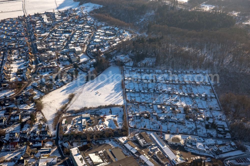 Arnsberg from above - Wintry snowy Parcel of a small garden in the district Huesten in Arnsberg in the state North Rhine-Westphalia