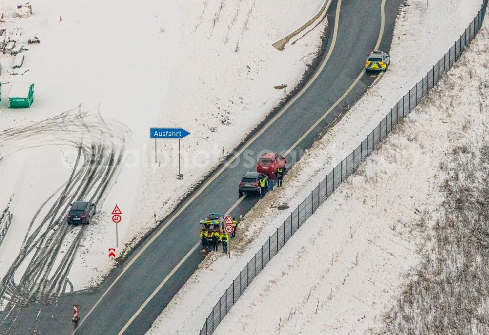 Aerial image Nuttlar - Wintry snowy officials in a police operation to a speed control and Traffic control on federal motorway B480 in Nuttlar in the state North Rhine-Westphalia, Germany