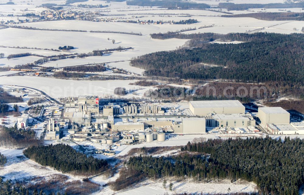 Aerial image Feldschlößchen - Wintry snowy production facilities of the Sachsenmilch company in Leppersdorf in the federal state of Saxony