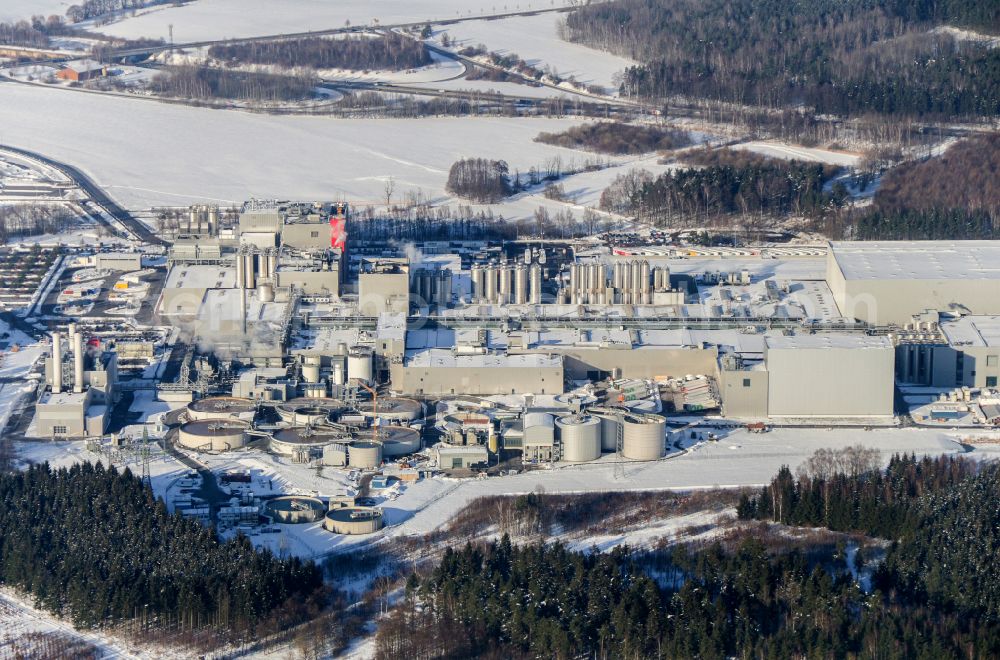 Aerial photograph Feldschlößchen - Wintry snowy production facilities of the Sachsenmilch company in Leppersdorf in the federal state of Saxony