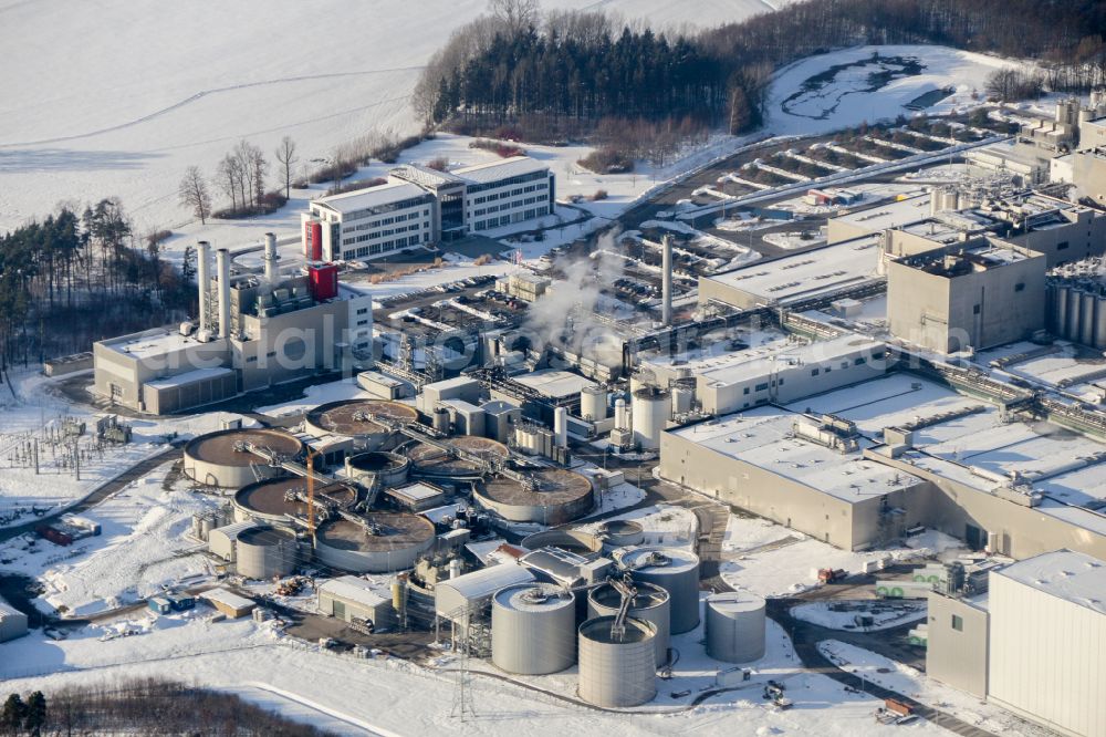 Feldschlößchen from above - Wintry snowy production facilities of the Sachsenmilch company in Leppersdorf in the federal state of Saxony