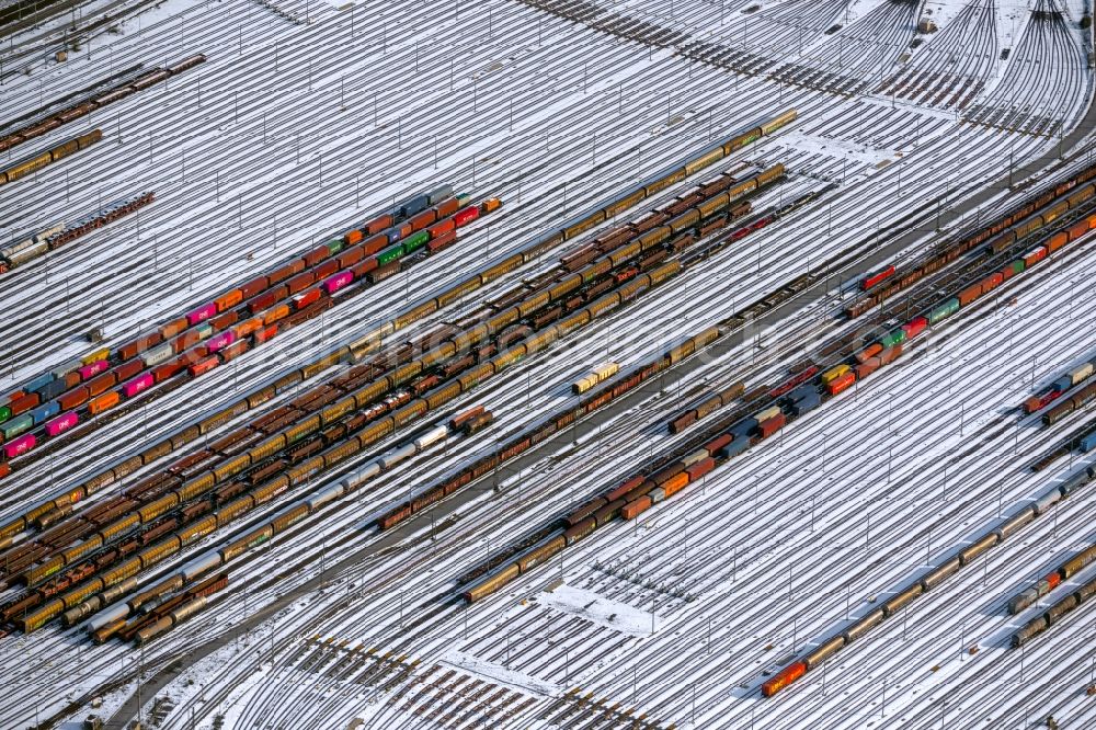 Seevetal from the bird's eye view: Wintry snowy marshalling yard and freight station of the Deutsche Bahn in Maschen in the state Lower Saxony, Germany