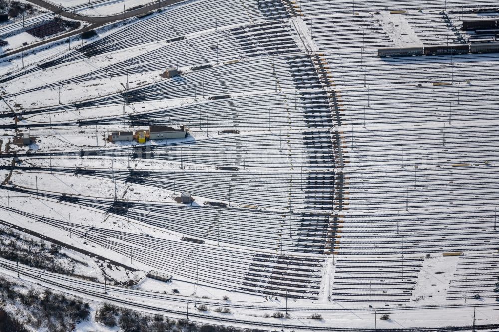 Seevetal from the bird's eye view: Wintry snowy marshalling yard and freight station Maschen of the Deutsche Bahn in the district Maschen in Seevetal in the state Lower Saxony, Germany