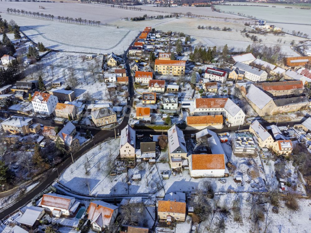 Bannewitz from the bird's eye view: Winter snow-covered village view of Rippien in the state of Saxony, Germany