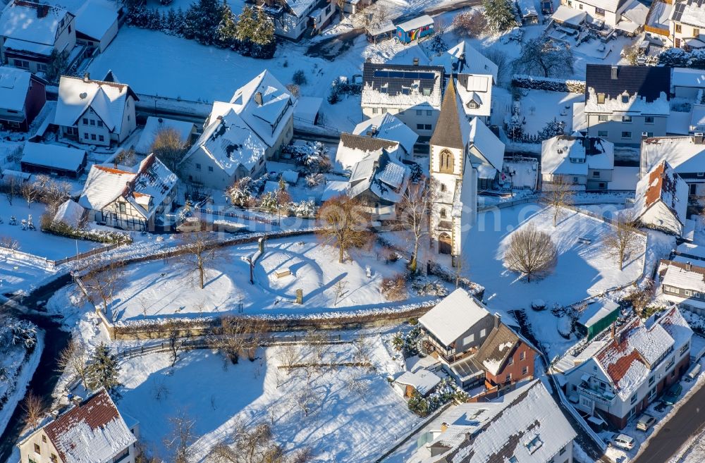 Brilon from above - Wintry snowy ruins of church building Kirchturm- Reste am Kirchberg in the district Messinghausen in Brilon in the state North Rhine-Westphalia