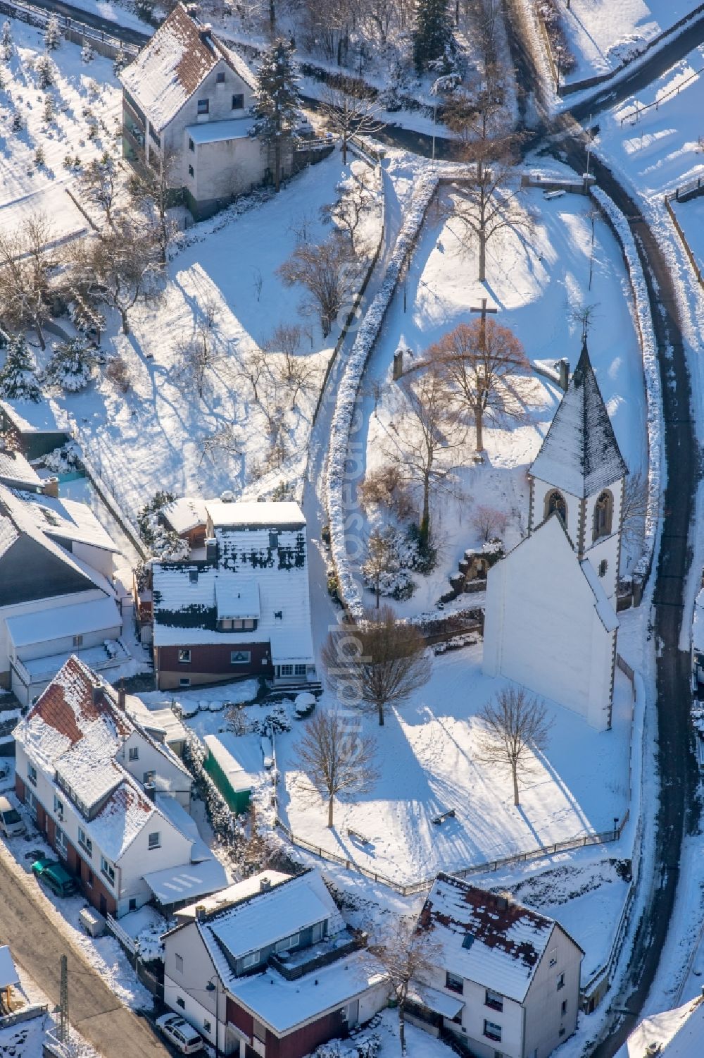 Brilon from above - Wintry snowy ruins of church building Kirchturm- Reste am Kirchberg in the district Messinghausen in Brilon in the state North Rhine-Westphalia