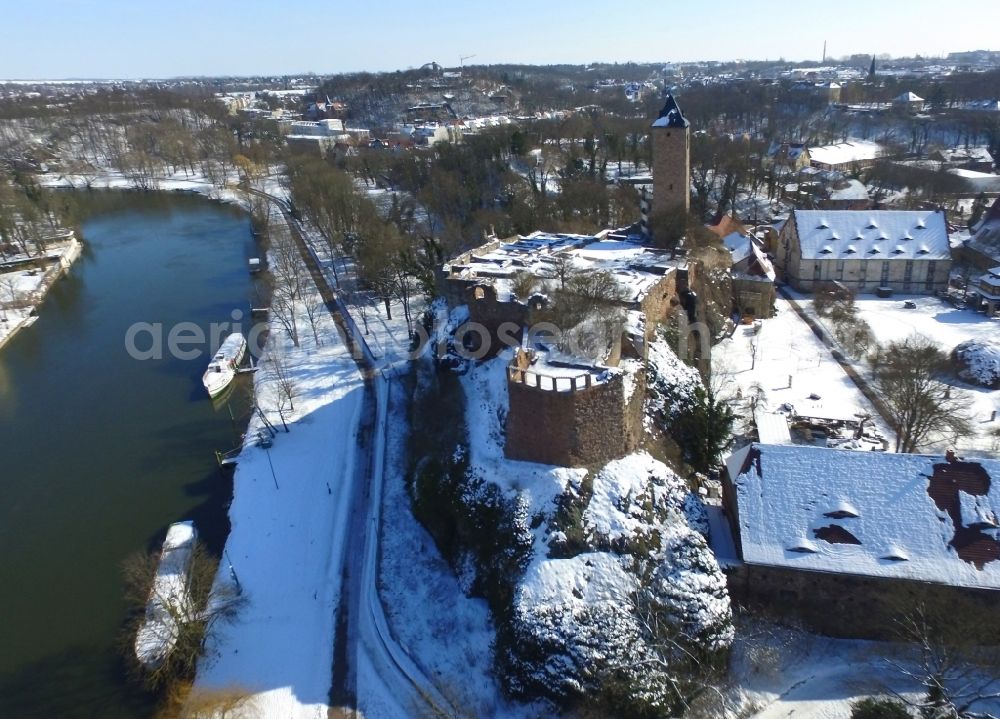 Aerial image Halle (Saale) - Wintry snowy Ruins and vestiges of the former castle and fortress Burg Giebichenstein in Halle (Saale) in the winter with snow in the state Saxony-Anhalt, Germany