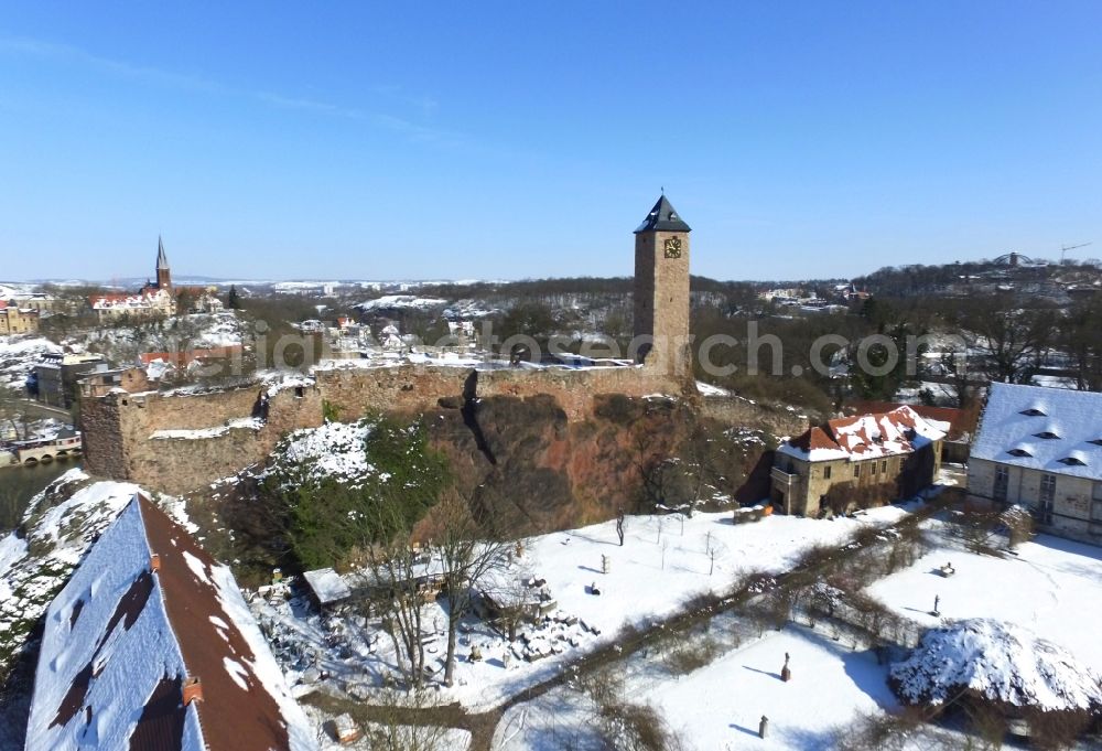 Aerial image Halle (Saale) - Wintry snowy Ruins and vestiges of the former castle and fortress Burg Giebichenstein in Halle (Saale) in the winter with snow in the state Saxony-Anhalt, Germany