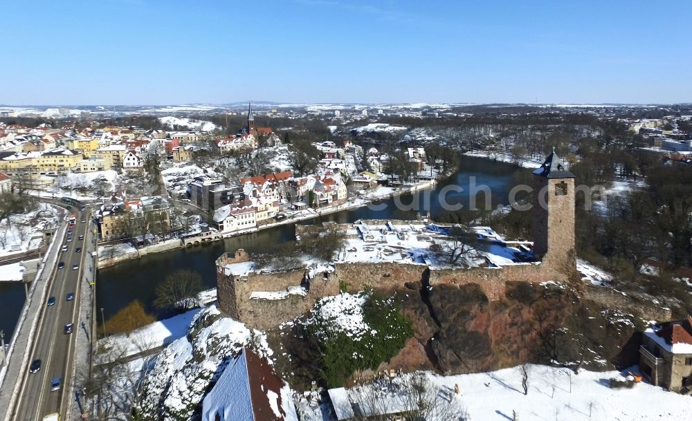 Aerial photograph Halle (Saale) - Wintry snowy Ruins and vestiges of the former castle and fortress Burg Giebichenstein in Halle (Saale) in the winter with snow in the state Saxony-Anhalt, Germany