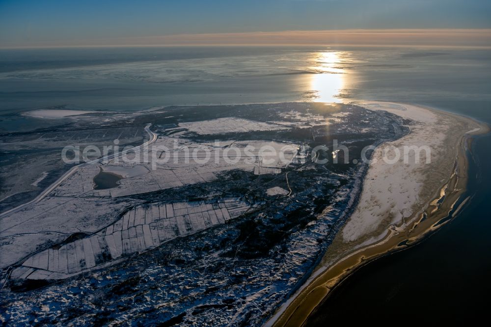 Borkum from the bird's eye view: Wintry snowy nothern sandy coastline on the North Sea Island Borkum in the state Lower Saxony