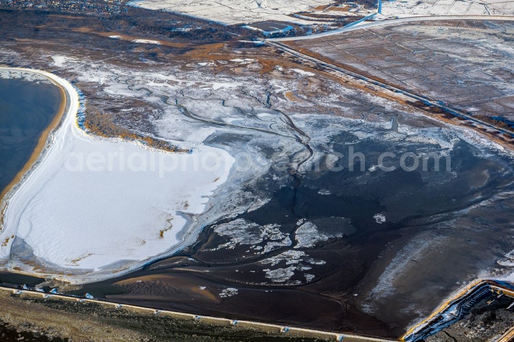 Aerial image Borkum - Wintry snowy beach landscape along the of North Sea in Borkum in the state Lower Saxony, Germany