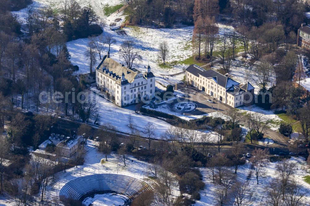 Essen from the bird's eye view: Wintry snowy building complex in the park of the castle on street Schlossstrasse in the district Borbeck in Essen at Ruhrgebiet in the state North Rhine-Westphalia, Germany