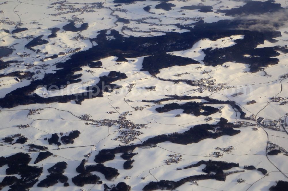 Schleedorf from the bird's eye view: Wintry snowy landscape at Schleedorf in Salzburg, Austria