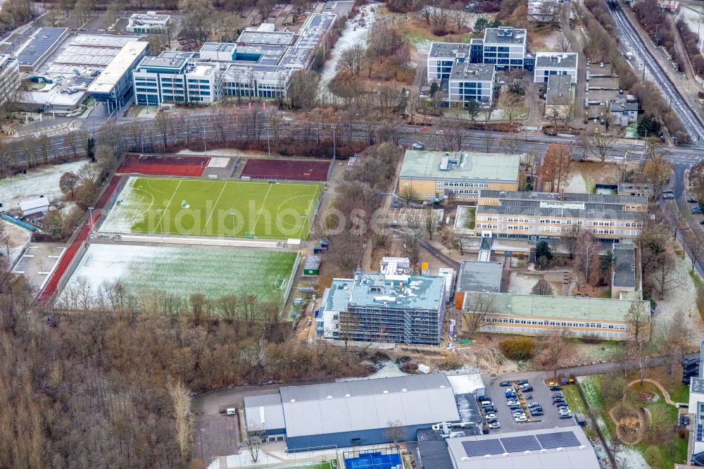 Dortmund from above - Wintry snowy school building of the Max-Planck-Gymnasium on street Ardeystrasse in the district Ruhrallee West in Dortmund at Ruhrgebiet in the state North Rhine-Westphalia, Germany