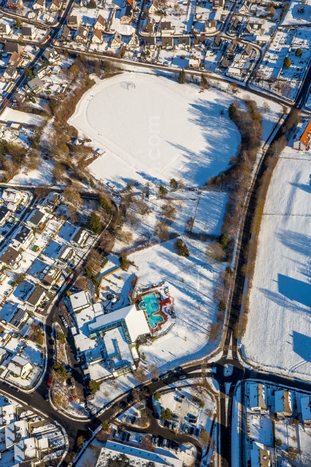 Warstein from above - Wintry snowy swimming pool of the Allwetterbad Warstein on Lortzingstrasse in Warstein in the state North Rhine-Westphalia