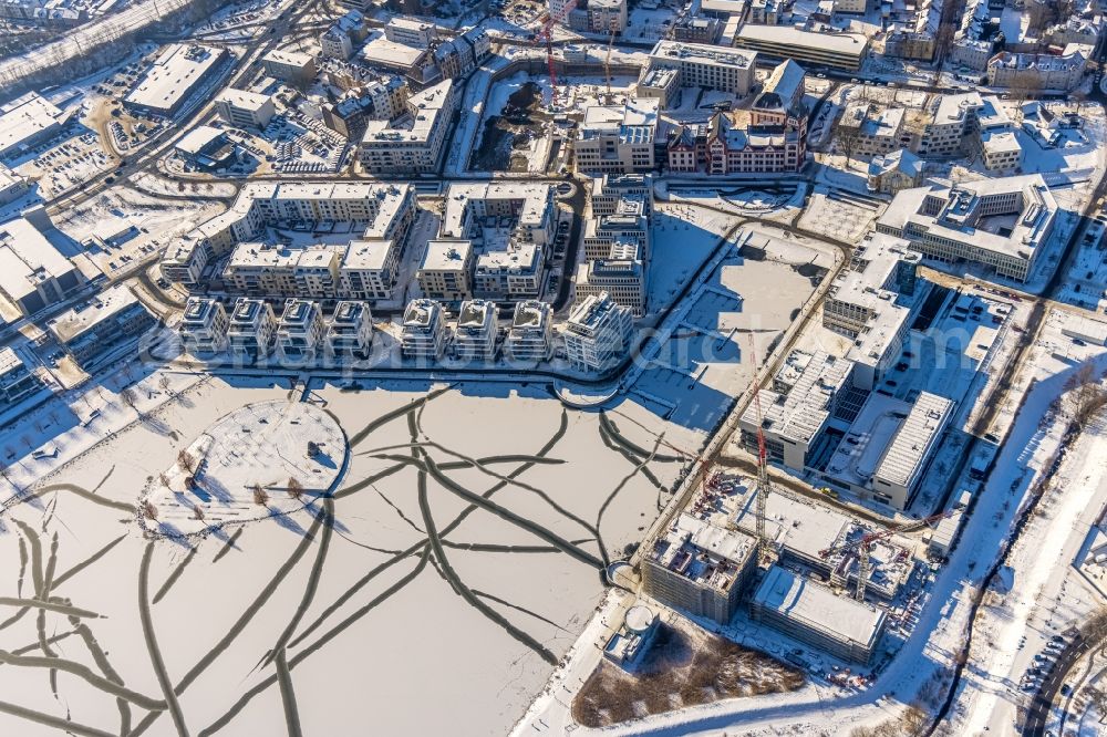 Aerial image Dortmund - Wintry snowy lake Island on the Plateau on Phoenixsee in the district Hoerde in Dortmund in the state North Rhine-Westphalia, Germany