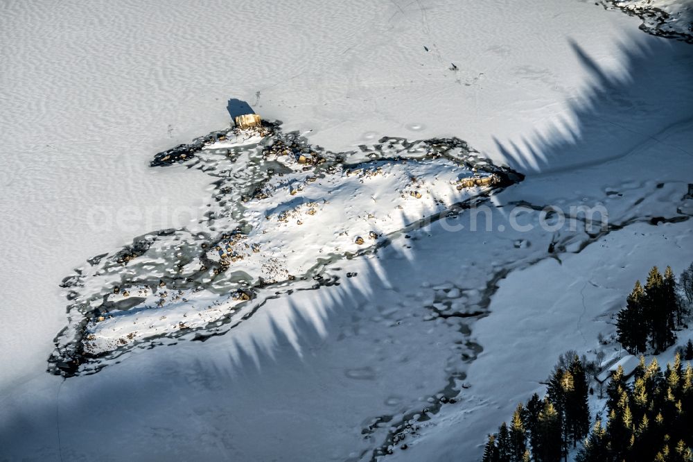 Schluchsee from above - Wintry snowy lake Island on the zugefrorenen Schluchsee in Schluchsee in the state Baden-Wurttemberg, Germany