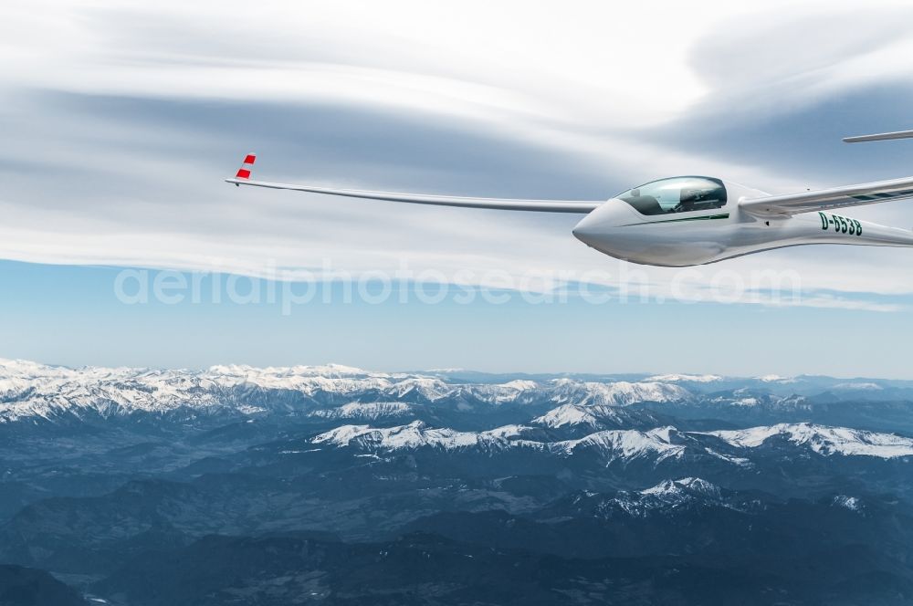 La Chapelle-en-Valgaudémar from the bird's eye view: The ASW 20 D-6538 glider flying above the wintry snowy mountains of the Ecrins National Park near La Chapelle-en-Valgaudemar in Provence-Alpes-Cote d'Azur, France