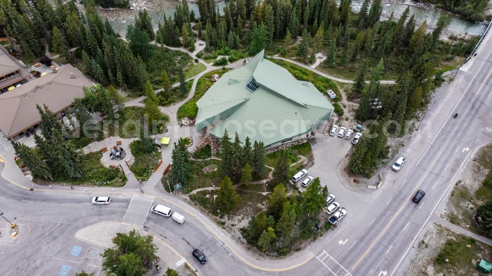 Aerial image Lake Louise - Wintry snowy tourist attraction and sightseeing Lake Louise Visitor Centre on street Village Road in Lake Louise in Alberta, Canada