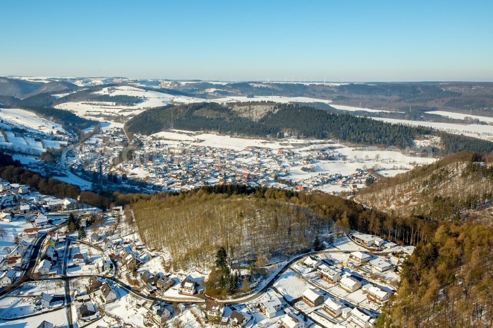 Marsberg from the bird's eye view: Wintry snowy Settlement area in the district Padberg in Marsberg in the state North Rhine-Westphalia