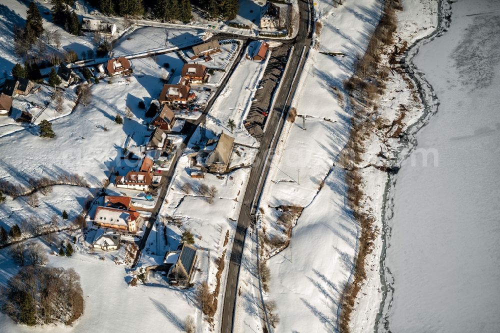 Schluchsee from the bird's eye view: Wintry snowy the district on Sommerberg in Schluchsee in the state Baden-Wurttemberg, Germany