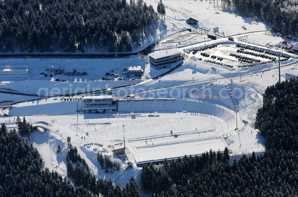 Aerial image Oberhof - Wintry snowy ski track with indoor skiing on street Tambacher Strasse in Oberhof in Thuringia