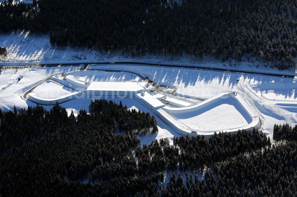 Aerial photograph Oberhof - Wintry snowy ski track with indoor skiing on street Tambacher Strasse in Oberhof in Thuringia