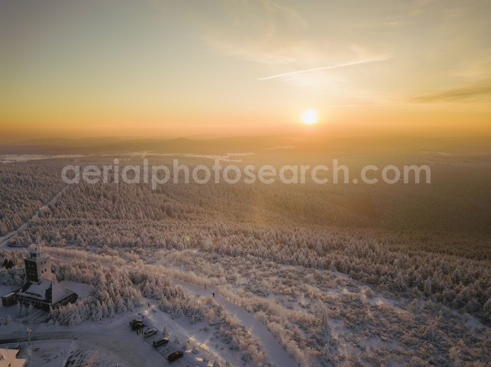 Aerial image Oberwiesenthal - Wintry snowy ski lifts and towers on the hilltop of Fichtelbergbahn at Oberwiesenthal in Saxony