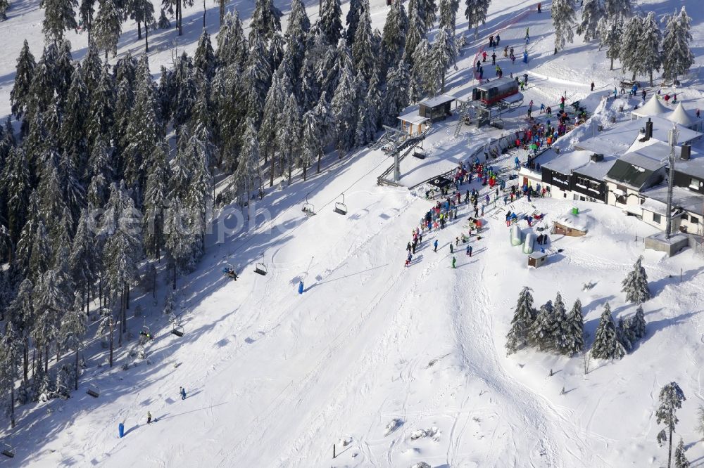 Braunlage from the bird's eye view: Wintry snowy Ski Area Wurmberg in Braunlage in the state Lower Saxony, Germany